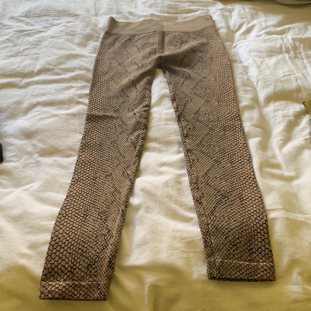 Textured brown and beige reptile pattern leggings by Nikibiki.